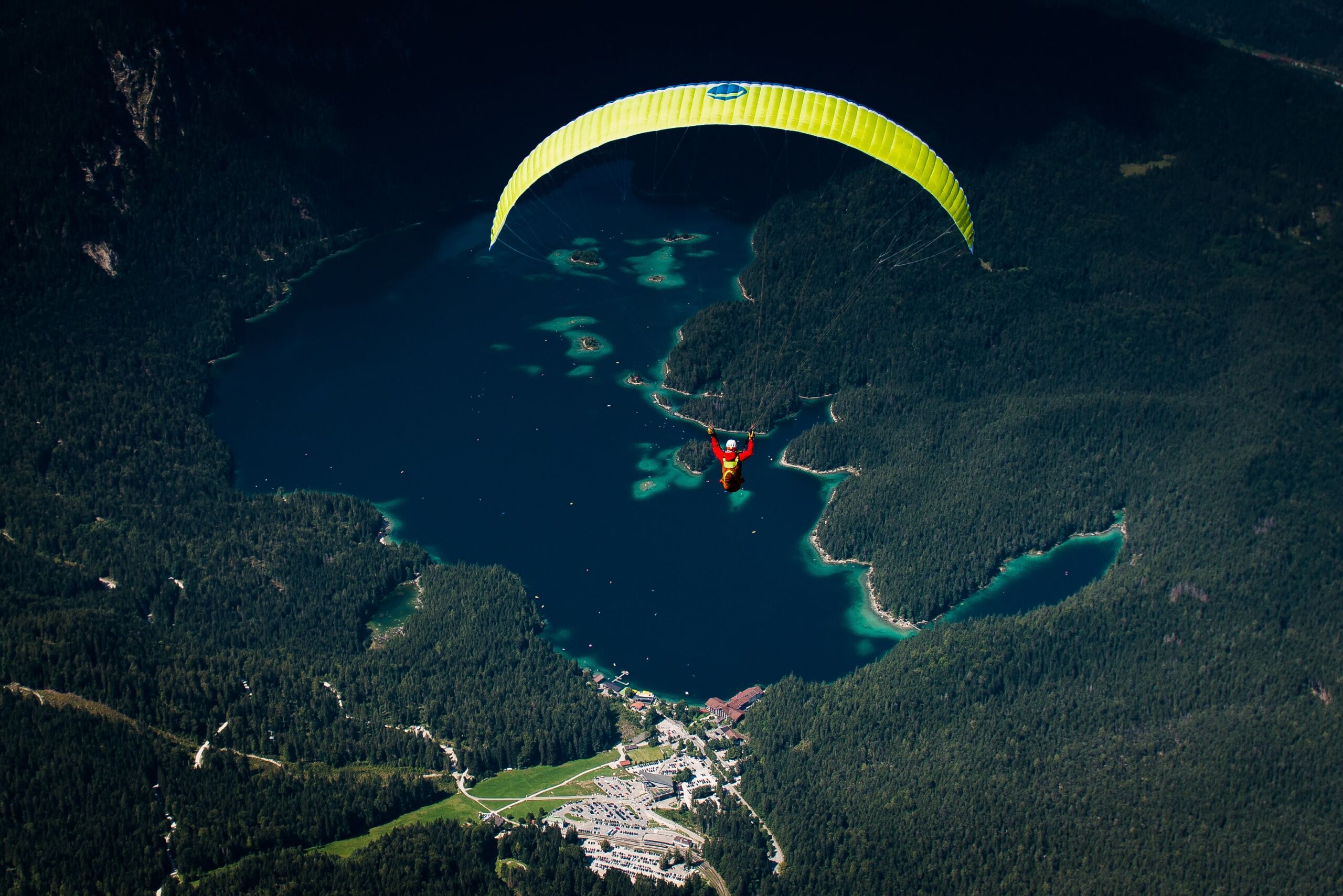 Tandem paraglider above the mountains around Garmisch-Partenkirchen